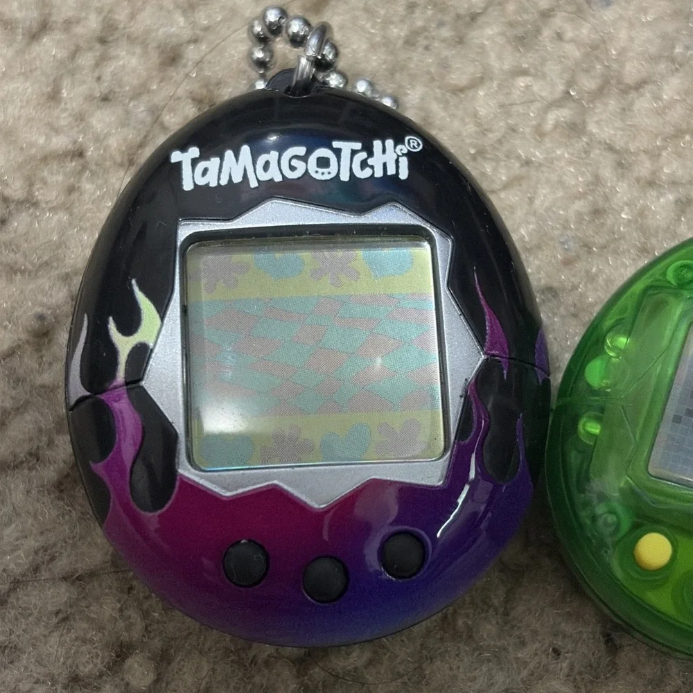 Bandai Tamagotchi Clear Green  Working And Purple Needs Battery